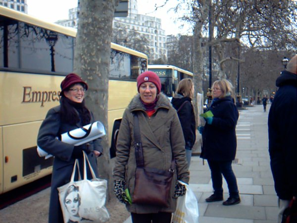 Joanna and Jill in front of coach