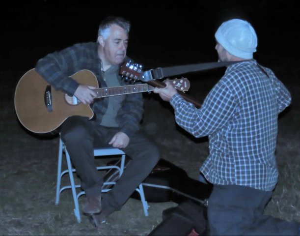 Karl and Antonio playing the guitar and mandolin